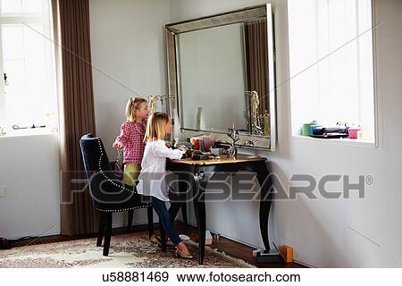 Two Girls Playing With Jewelry And Make Up View Large Photo Image Stock Photo - Two Girls Playing With Jewelry And Make Up. Fotosearch