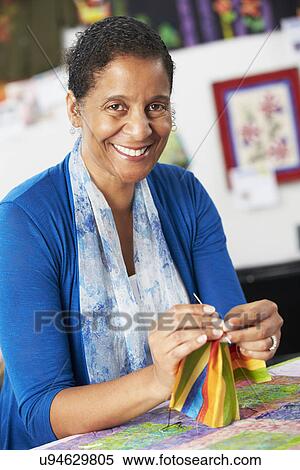 Two Women Sewing Quilt Together View Large Photo Image Stock Photography - Two Women Sewing Quilt Together. Fotosearch