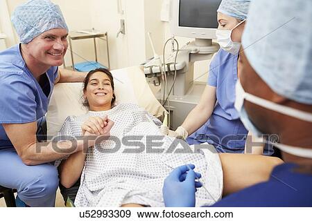 Woman Having Eggs Implanted As Part Of IVF Treatment View Large Photo Image Stock Photo - Woman Having Eggs Implanted As Part Of IVF Treatment. Fotosearch