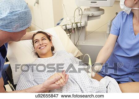 Woman Having Eggs Implanted As Part Of IVF Treatment View Large Photo Image Stock Photo - Woman Having Eggs Implanted As Part Of IVF Treatment. Fotosearch
