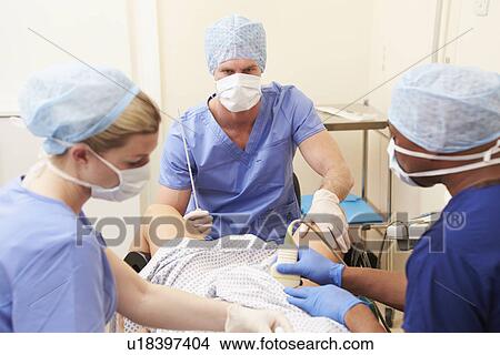 Woman Having Eggs Removed As Part Of IVF Treatment View Large Photo Image Picture - Woman Having Eggs Removed As Part Of IVF Treatment. Fotosearch