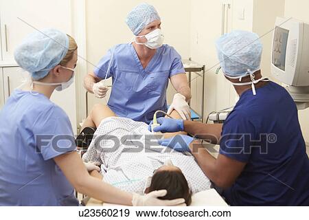 Woman Having Eggs Removed As Part Of IVF Treatment View Large Photo Image Stock Photo - Woman Having Eggs Removed As Part Of IVF Treatment. Fotosearch