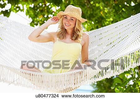 Woman Relaxing In Beach Hammock View Large Photo Image Picture - Woman Relaxing In Beach Hammock. Fotosearch