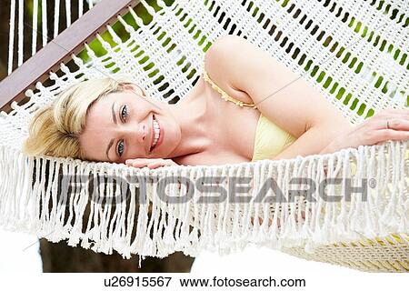 Woman Relaxing In Beach Hammock View Large Photo Image Stock Photo - Woman Relaxing In Beach Hammock. Fotosearch