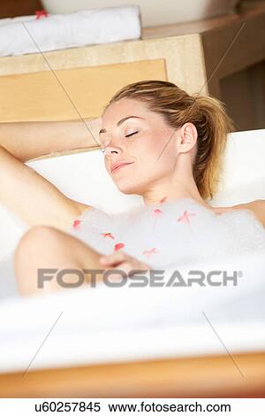 Woman Relaxing In Bubble Bath View Large Photo Image Stock Photography - Woman Relaxing In Bubble Bath. Fotosearch