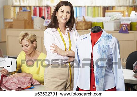 Stock Image - Women In Dress Making Class. Fotosearch