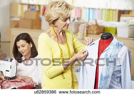 Stock Photograph - Women In Dress Making Class. Fotosearch