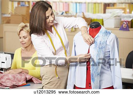 Stock Photography - Women In Dress Making Class. Fotosearch