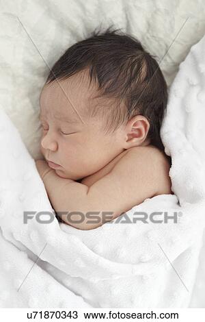 Stock Image - 26 day old baby girl. Fotosearch