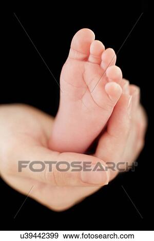 Stock Photo - Baby's foot. Fotosearch