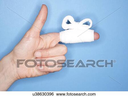 Stock Photograph - Bandaged finger. Fotosearch