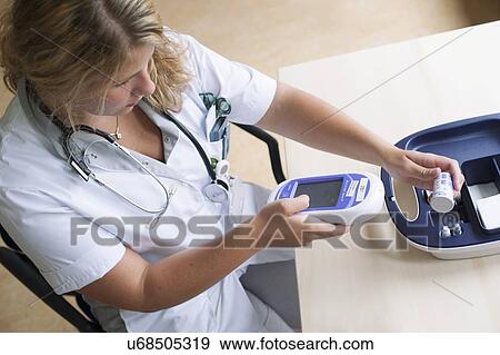 Blood glucose meter View Large Photo Image Stock Photo - Blood glucose meter. Fotosearch