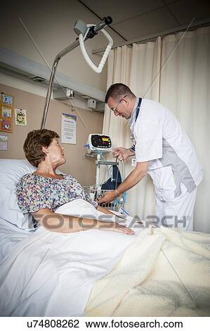 Stock Image - Blood pressure measurement. Fotosearch