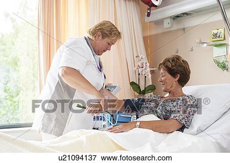 Blood pressure measurement View Large Photo Image Stock Photo - Blood pressure measurement. Fotosearch
