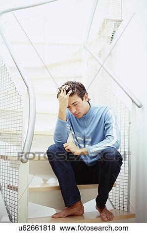 Stock Photo - Depressed man. Fotosearch