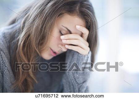 Stock Image - Depressed woman. Fotosearch