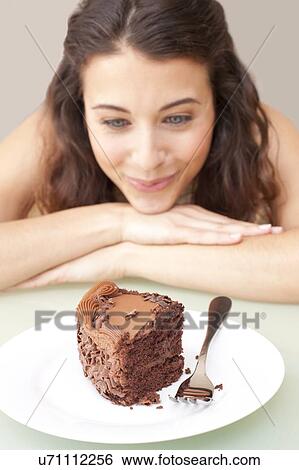 Stock Photograph - Diet temptation. Fotosearch