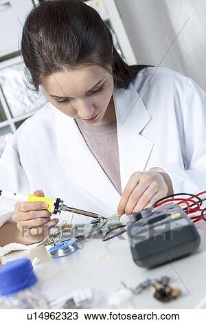 Stock Image - Electronics student. Fotosearch