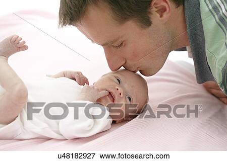 Father and two week old daughter View Large Photo Image Stock Photo - Father and two week old daughter. Fotosearch