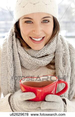 Stock Photo - Happy woman in cold weather. Fotosearch