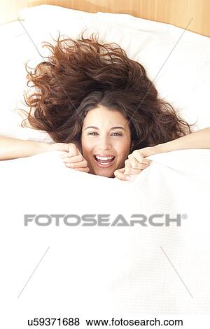 Stock Photo - Happy woman. Fotosearch