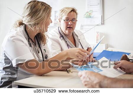 Hospital nursing meeting View Large Photo Image Stock Photo - Hospital nursing meeting. Fotosearch