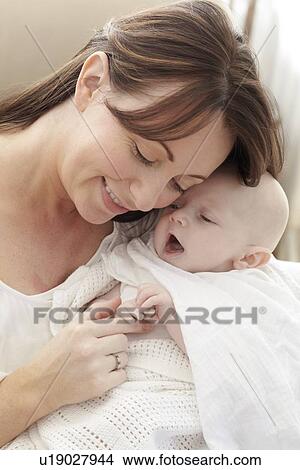 Picture - Mother and baby. Fotosearch