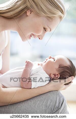 Stock Photography - Mother and baby. Fotosearch