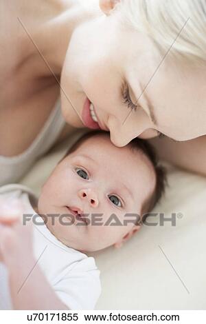 Stock Photography - Mother and baby. Fotosearch
