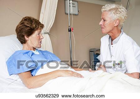 Stock Photo - Nurse and patient. Fotosearch