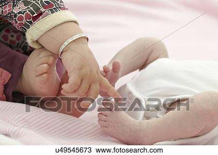 One year old girl with baby sister View Large Photo Image Stock Image - One year old girl with baby sister. Fotosearch