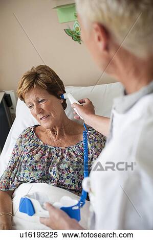 Taking temperature View Large Photo Image Stock Photography - Taking temperature. Fotosearch