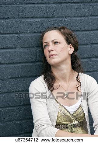 Woman deep in thought View Large Photo Image Stock Image - Woman deep in thought. Fotosearch