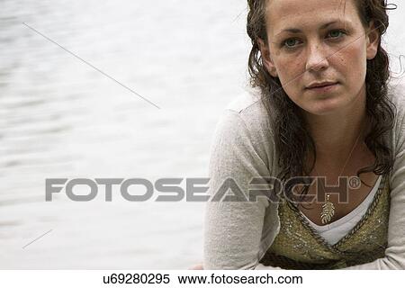 Woman deep in thought View Large Photo Image Stock Photography - Woman deep in thought. Fotosearch