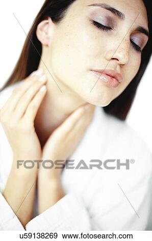 Woman feeling her glands View Large Photo Image Stock Photo - Woman feeling her glands. Fotosearch
