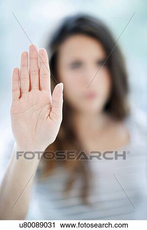 Stock Image - Woman making stop sign. Fotosearch