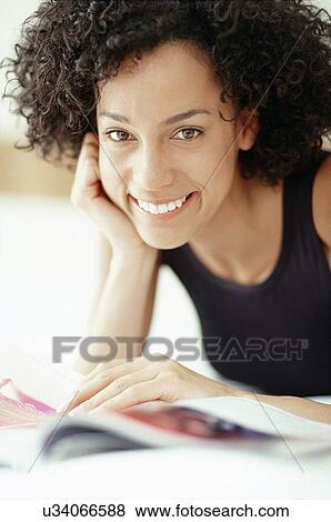 Woman reading View Large Photo Image Stock Photo - Woman reading. Fotosearch