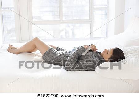 Stock Image - Woman sleeping. Fotosearch