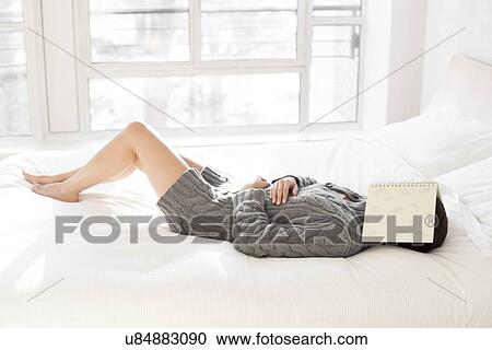 Stock Image - Woman sleeping. Fotosearch
