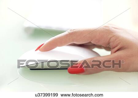 Woman using a mouse View Large Photo Image Stock Photo - Woman using a mouse. Fotosearch