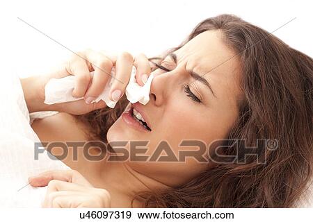 Stock Photo - Woman with a cold. Fotosearch