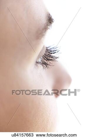 Stock Image - Woman's eye in profile. Fotosearch