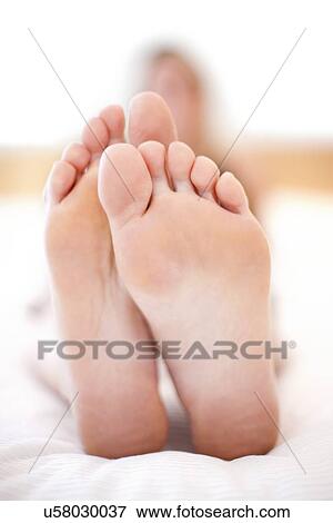 Stock Photo - Woman's feet. Fotosearch