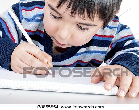 Young boy drawing View Large Photo Image Picture - Young boy drawing. Fotosearch