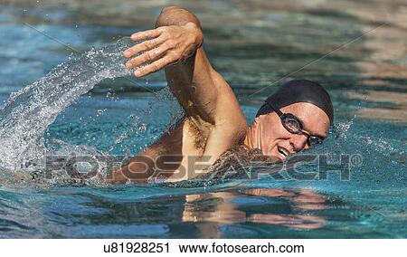 Athletic man swimming View Large Photo Image Stock Image - Athletic man swimming. Fotosearch