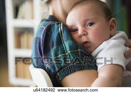 Baby girl (2-5 months) being embraced by mother View Large Photo Image Stock Image - Baby girl (2-5 months) being embraced by mother. Fotosearch