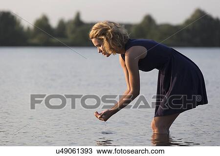 Beautiful woman in lake View Large Photo Image Stock Image - Beautiful woman in lake. Fotosearch