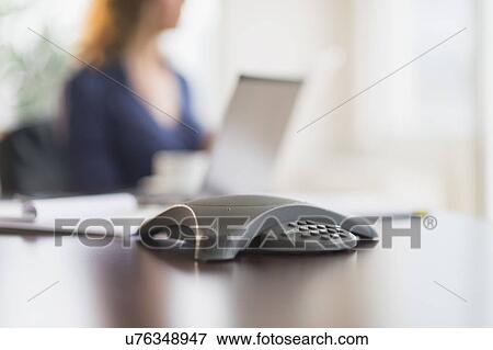 Business phone on office desk View Large Photo Image Stock Photo - Business phone on office desk. Fotosearch