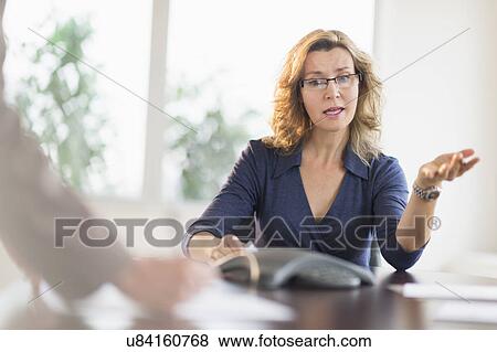 Stock Photo - Business woman arguing. Fotosearch