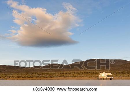 Camper van on road View Large Photo Image Stock Image - Camper van on road. Fotosearch